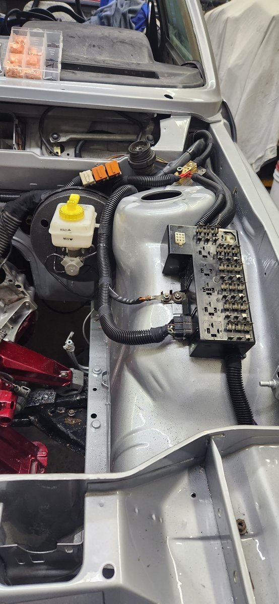 Cleaned wiring and integration work in BMW engine bay